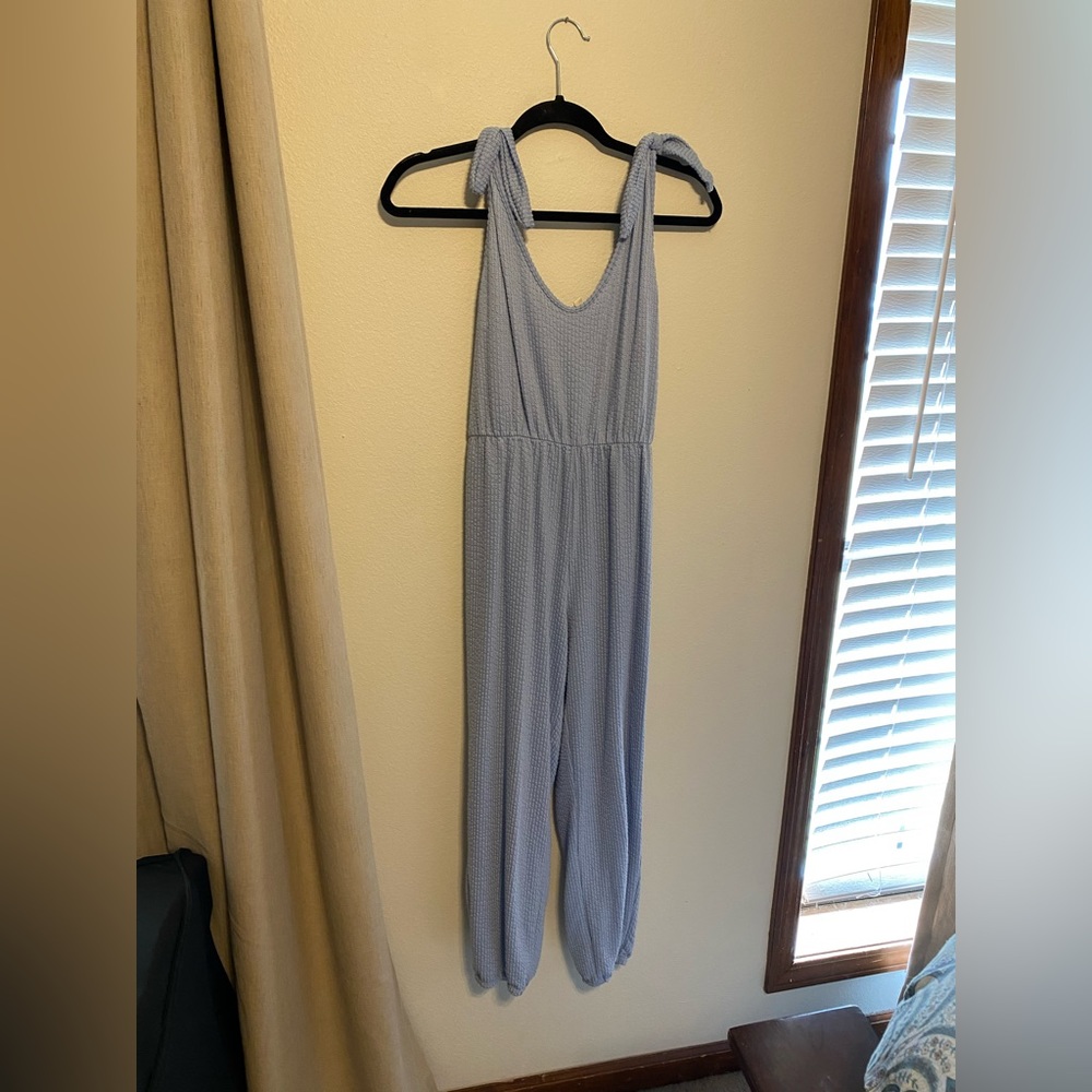 Soft jumpsuit with cinch waist.